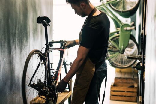 A man fixing a bicycle
