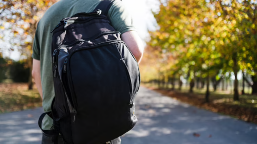 Man with a Bike Backpack in the Park