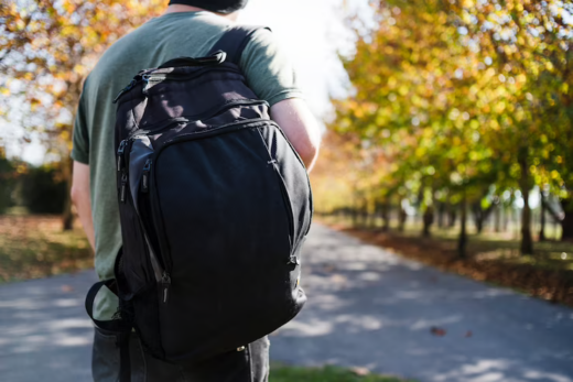 Man with a Bike Backpack in the Park